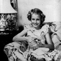 1948, May: Kathy on couch