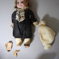 Jointed porcelain doll, boy in suit