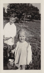1941, April 13: Easter, Wally and Kathy pose with their baskets.