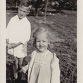 1941, April 13: Easter, Wally and Kathy pose with their baskets.