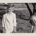 1941, April 13: Easter, Wally and Kathy stare into the sun.