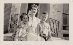 1941, October: Kathy, a smiling Esther and Wally F in front of Sharyland home.