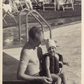 1941, September: Wallace holding Kathy near pool at the KC Country Club