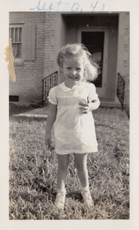1941, September: Kathy in yard of Sharyland house.