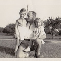 1941, September: Wallace posing with Wally F and Kathy.