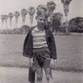 1942, March: Wally carrying a case