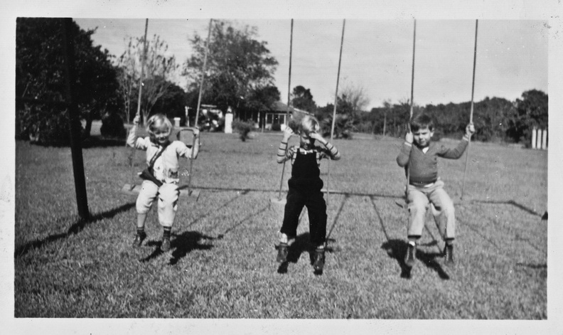 I am assuming the boy at the right is Dick, Lewis and Emmy's eldest son. Uncle Dick, as we knew him, was a big, boisterous man whom I always liked. He was a builder of beautiful homes in McAllen, but I was never comfortable that he somehow got hold of Mexican artifacts, such as carved stone hieroglyphs, and installed them in his homes for decorative purposes. 42KWDickSwingsShary_jpeg.jpg
