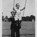 1942: Uncle Lewis pushes Kathy in the swing