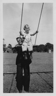 1942: Uncle Lewis pushes Kathy in the swing