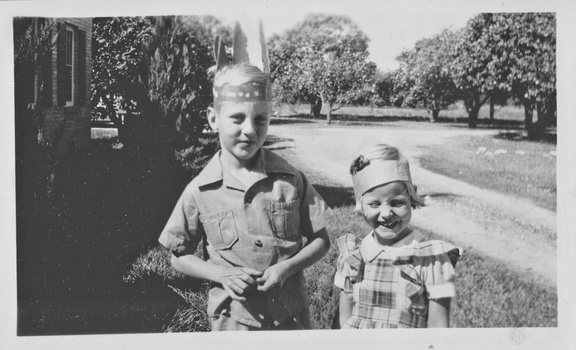 1944, Thanksgiving?: Kathy and Wally in "Indian" gear