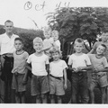 1944, October: Lewis and kids with the pony