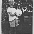 1944, Easter?: Wally F. holding a white rabbit