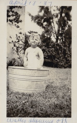1937, April: "Wally showing off" in tub, McAllen?