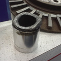 And the reason for the tow was this caliper piston getting jammed in between the cooling fins and locking up the wheel!