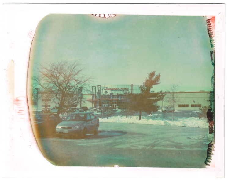 First Polaroid shot. Unknown age and type of Polaroid Polacolor glossy 4x5 pack film found at dad's studio. I assumed 100 ISO and used the sunny 16 rule. Taken from the back door at work.
The first few sheets in the pack were dry and crumbly, but a few others had liquid in the pod. This is the only shot I got from the pack. G3E1382ER8.jpg