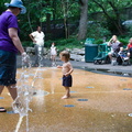 Wally and Mommy walking in the pop jets at the zoo.