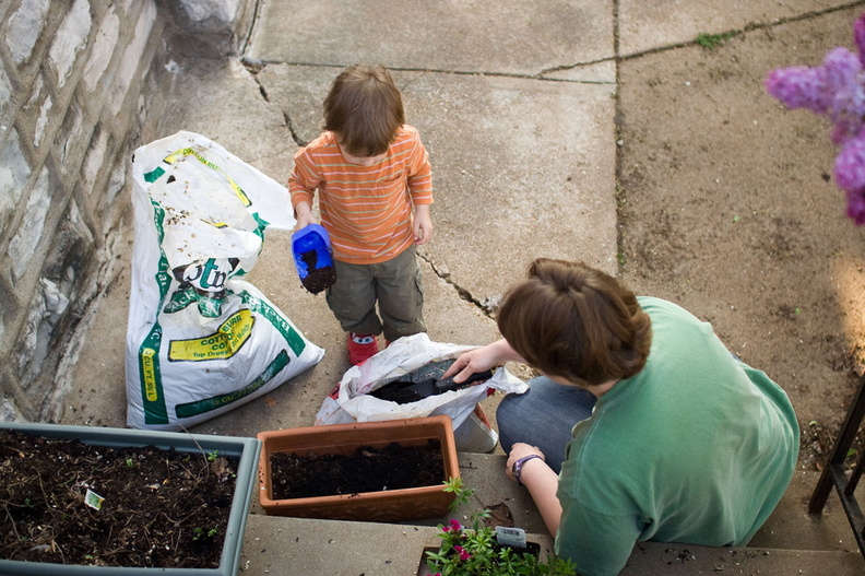 Wally and Mommy plant some cottage pinks.