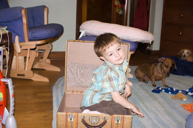 Wally tests out the little suitcase from GGma's I spotted this little gem as Janice was going through her mother's things. I thought it would be perfect for packing Wally for overnights with Max... and it is. It also reminded me of my little green suitcase that I packed once when I decided to run away. (I ultimately rejected the plan as unfeasible.) I think every child should have their own special case , as Wally calls it. IMG_9135.jpg