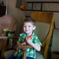 Wally tries out GGma's rocking chair and finds it to his liking.